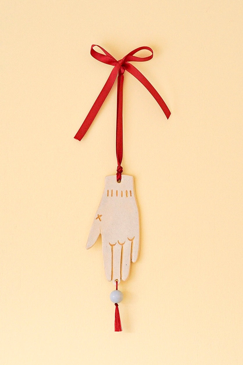 Festlicher Wandschmuck - Hand (blaue Perle)